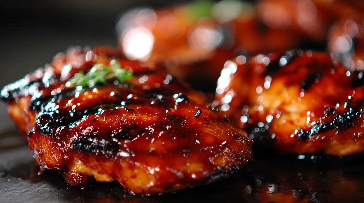 smoky Asian BBQ sauce brushed over grilled meat