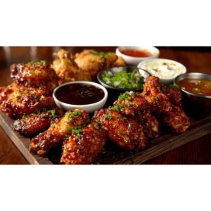 game day wing platter with multiple sauces and crispy wings