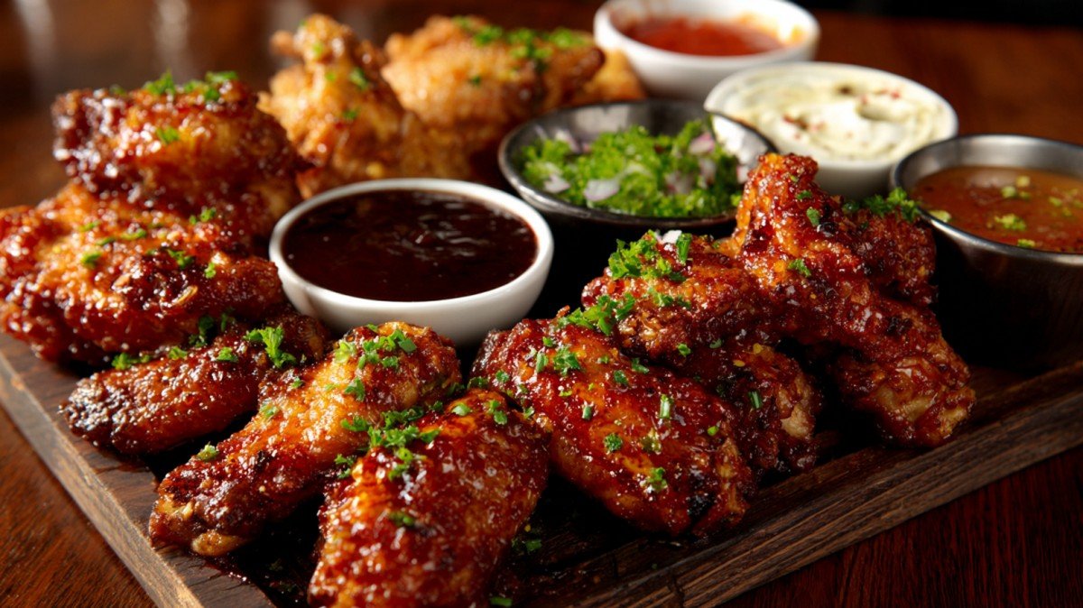 game day wing platter with multiple sauces and crispy wings