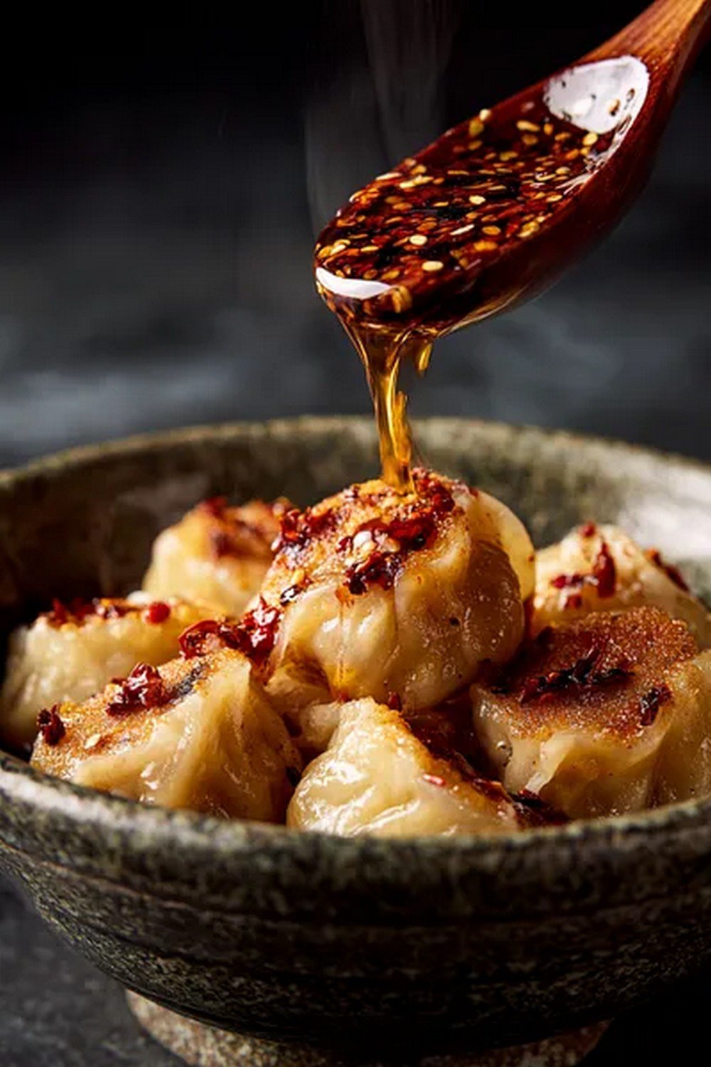 dumpling dipped in garlic chili sauce