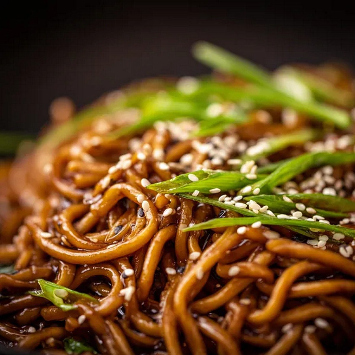 lo mein noodles coated in savory stir fry sauce

