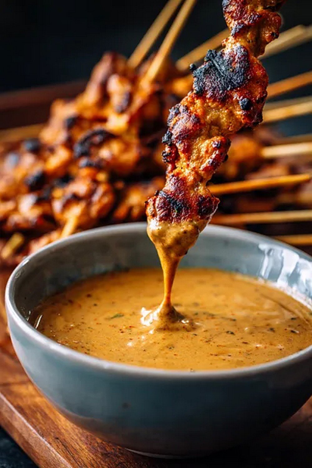 Action dip shot of Thai Peanut Sauce
